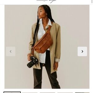 Kindly photographers sling bag with iPhone 15 pro case